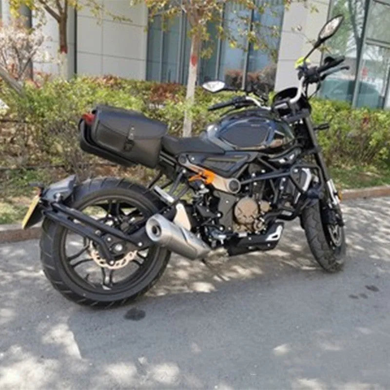 Black PU leather motorcycle swingarm saddlebag mounted on Sportster side showing 30x24x20cm dimensions