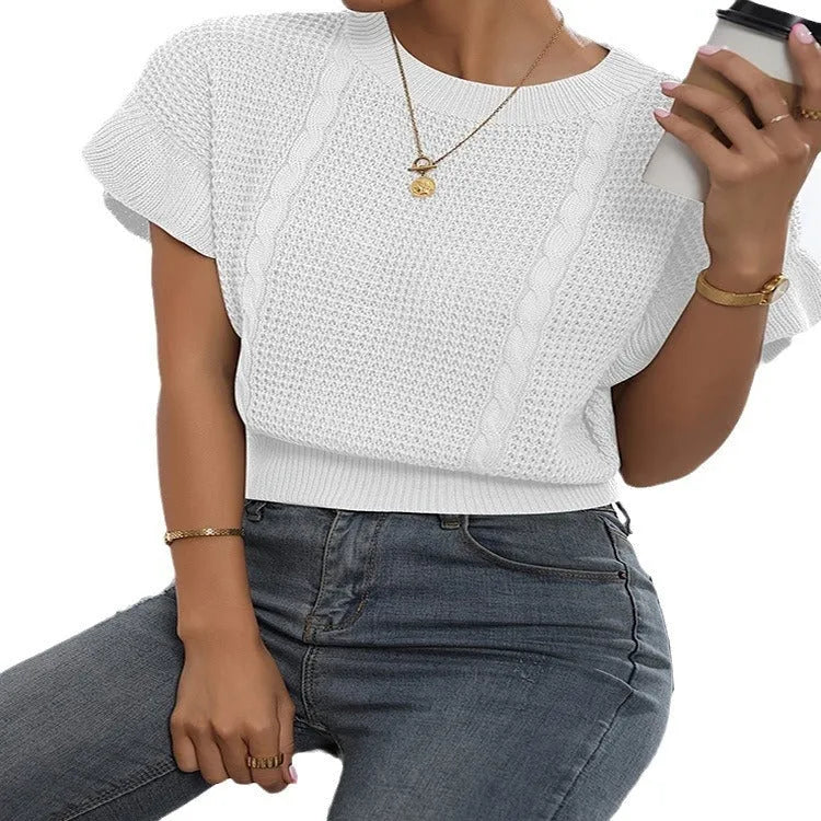 Loose white knitted pullover sweater with detailed twisted string ruffled short sleeves, round neck.