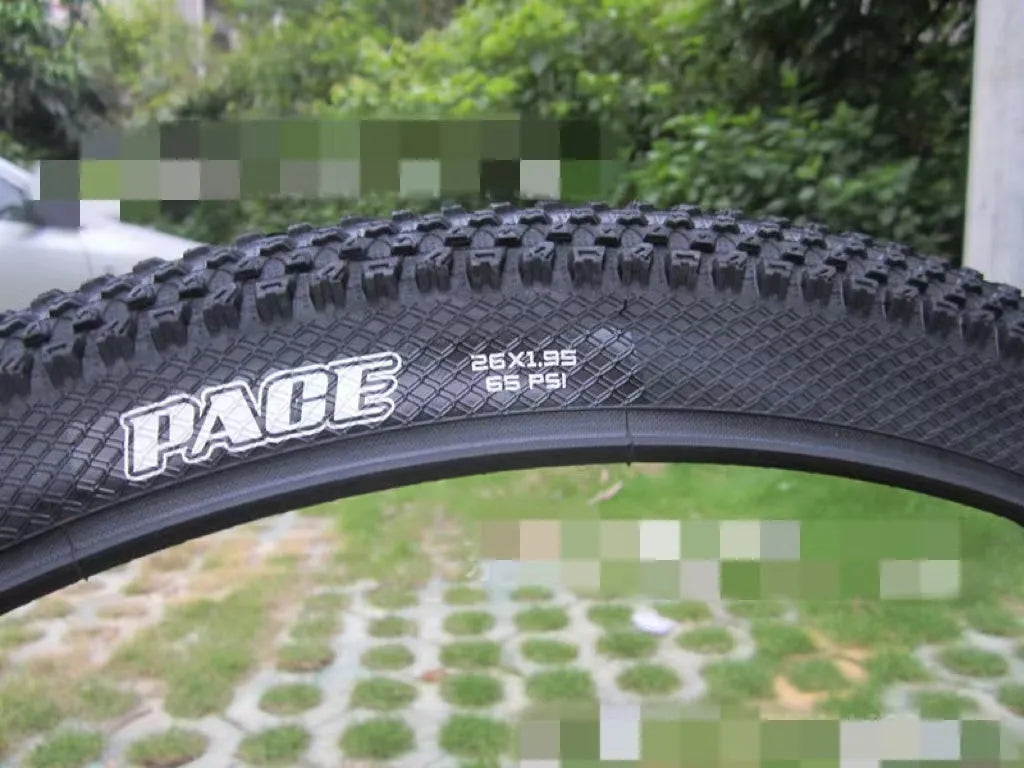 Ultralight puncture resistant mountain bike tyre shown in multiple sizes including 26, 27.5, and 29 inch diameters.
