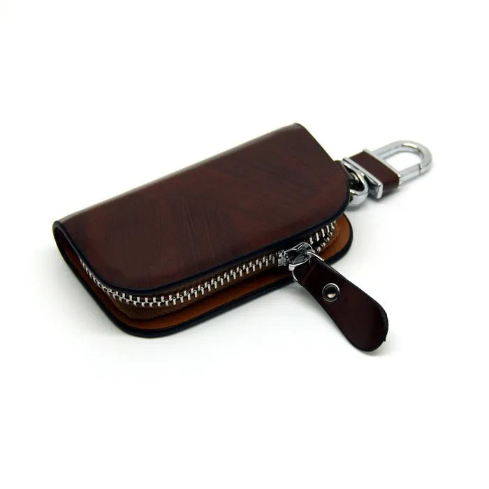Genuine cowhide leather car key case with frosted finish showing black and brown colour options