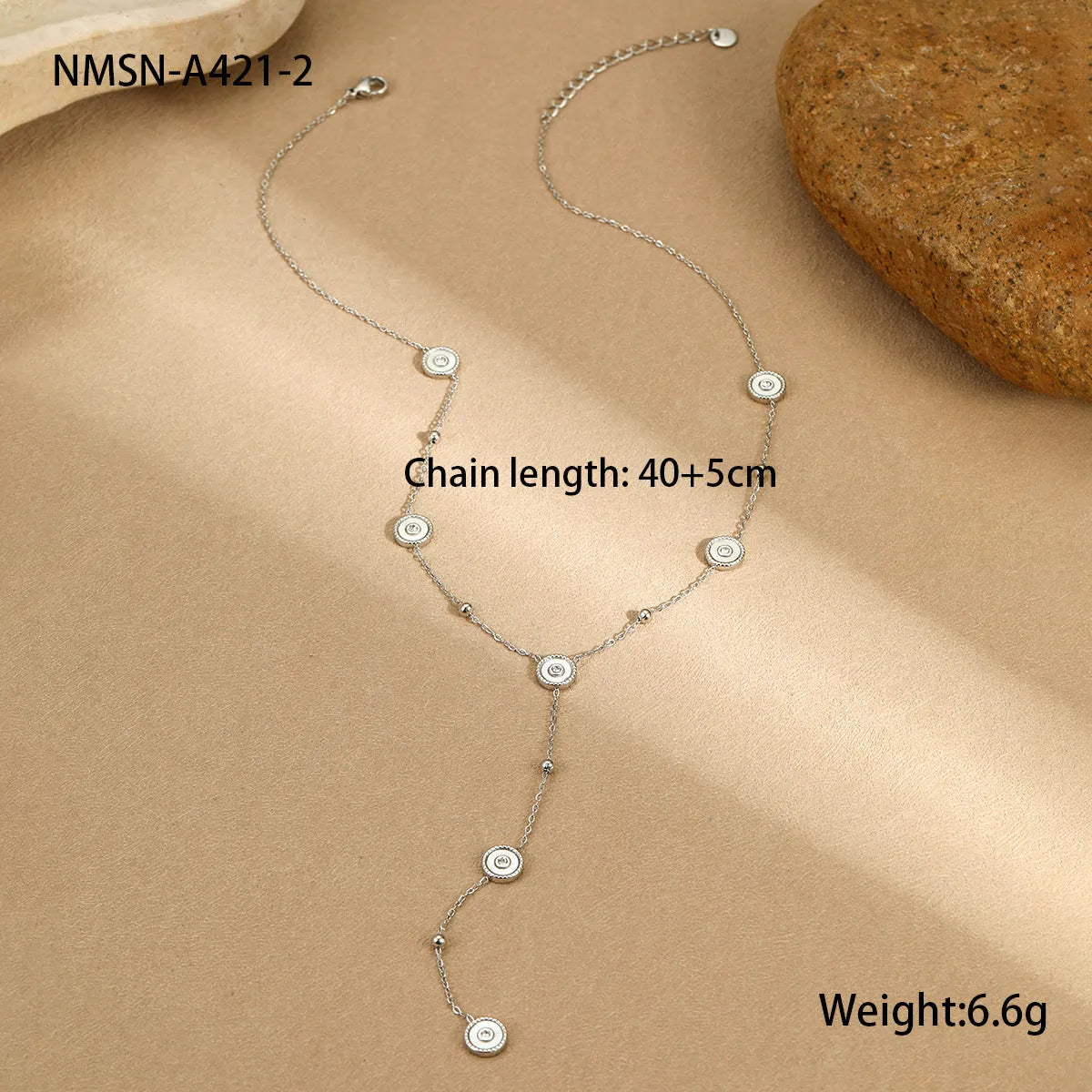 Geometric fritillary design stainless steel bracelet with 18K gold plating and matching necklace