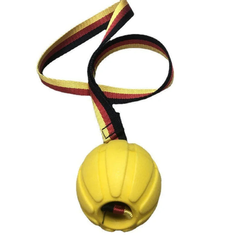 Camouflage and yellow floating EVA dog balls with tether strings in three different sizes on blue background.