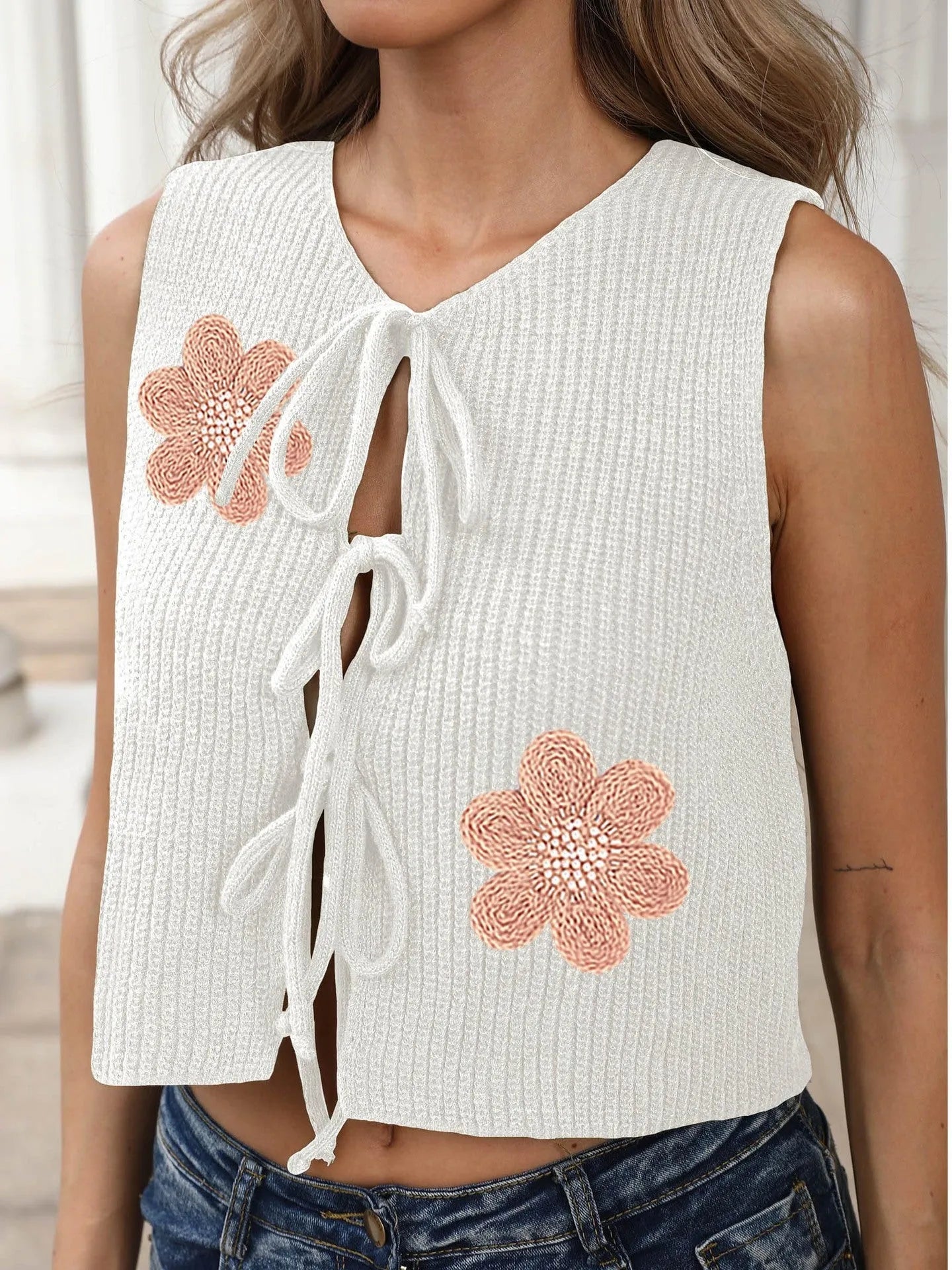 White ladies sleeveless cardigan vest with lace-up bow and apricot floral pattern