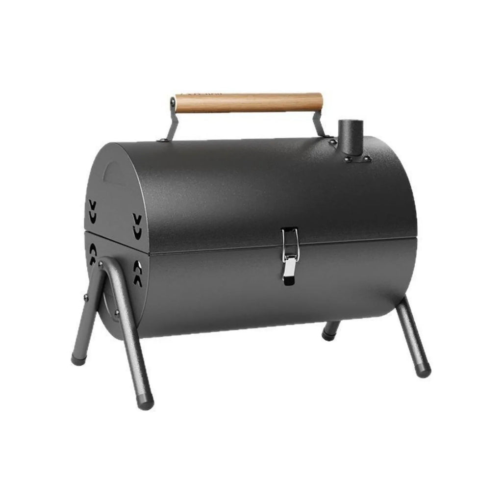 White portable folding barbecue grill with detachable rust-proof carbon tank for outdoor frying and baking.