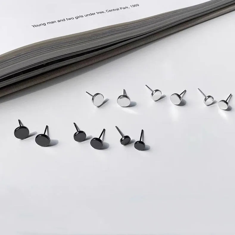 Sterling silver S999 flat ear bone studs in round geometry shape showing silver and black colour options