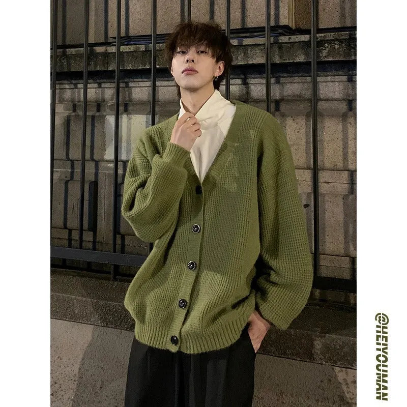 Men's loose V-neck cotton blend cardigan in army green, shown on a hanger.