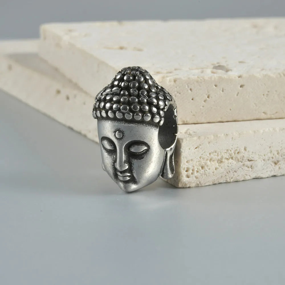 Stainless steel hollow skull Buddha geometric earrings with electroplated colour finishes