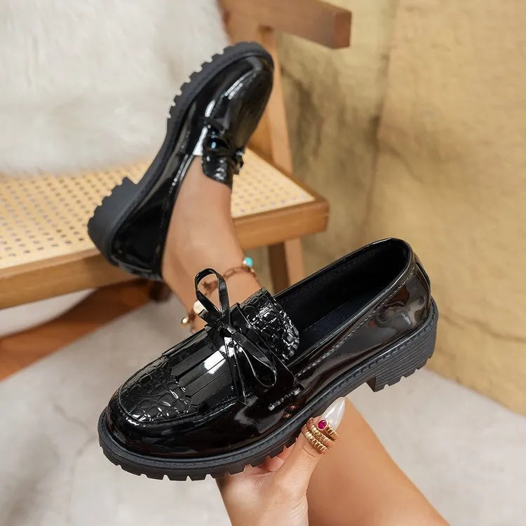 Women's black and brown bow loafers in artificial PU material with slip-on design for spring and autumn wear