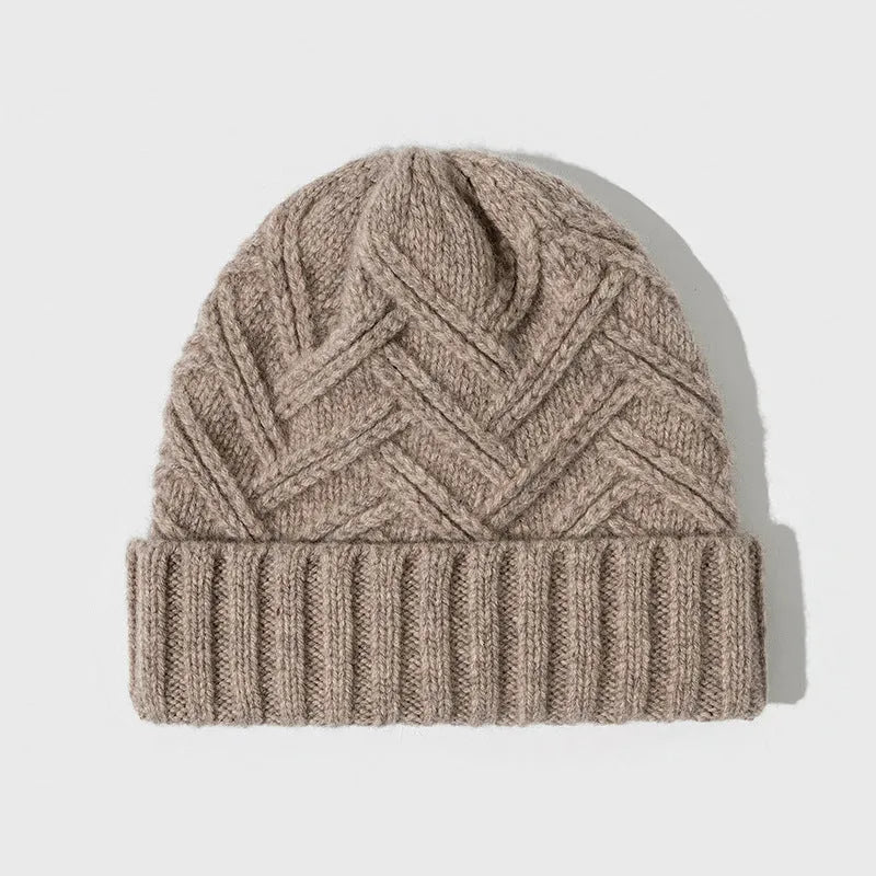 Women's wool knitted dome winter hat with a textured totem pattern.