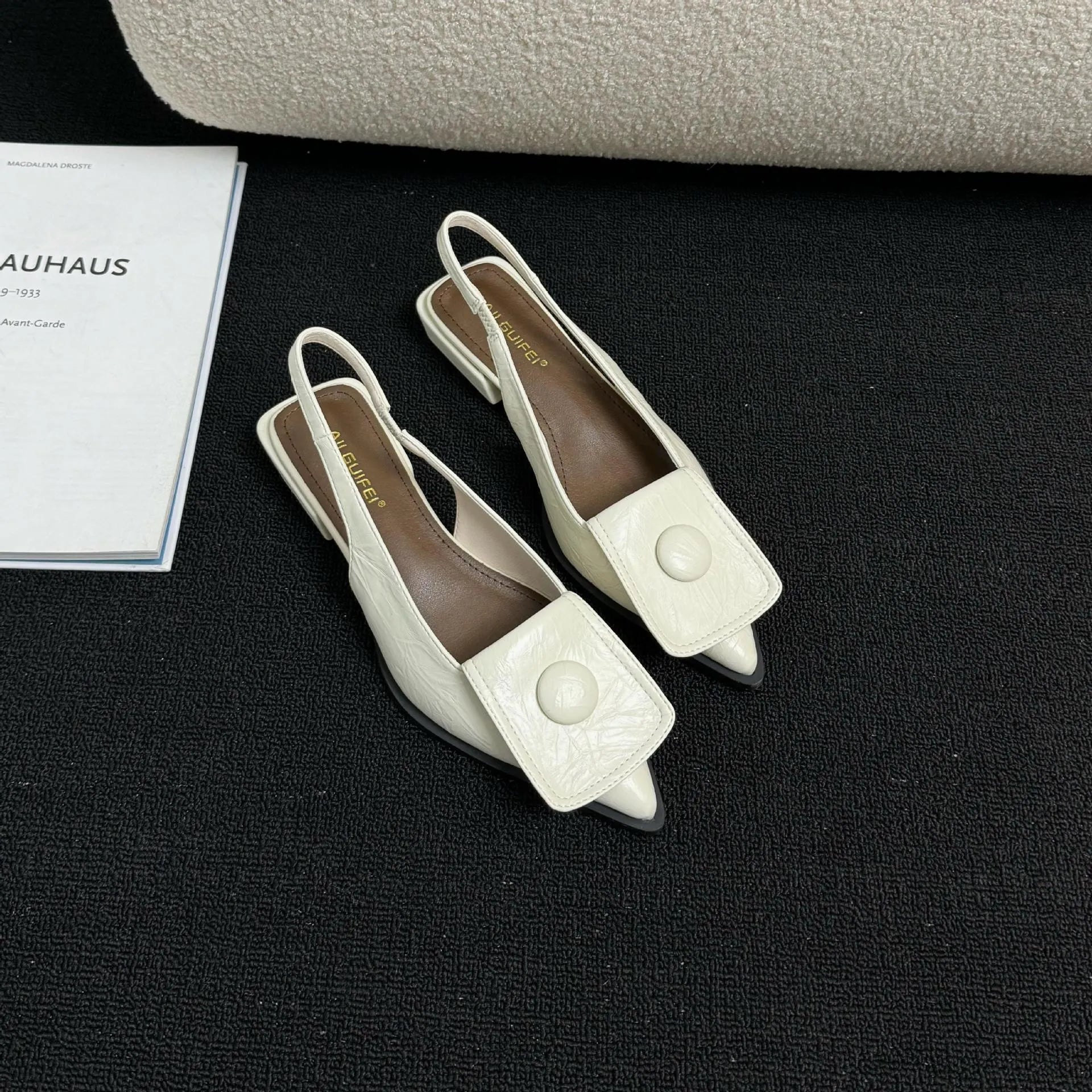 Women's low heel pointed toe sandals with back strap in apricot, black, brown, and silver colours.