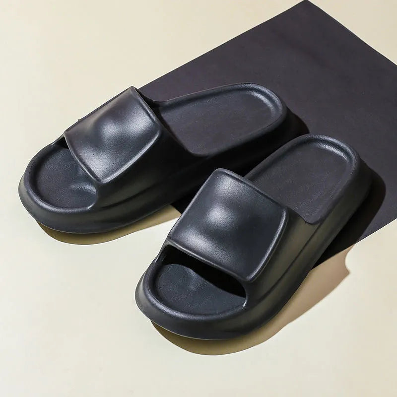 Thick sole EVA flip flop slippers in multiple colours on a white background.
