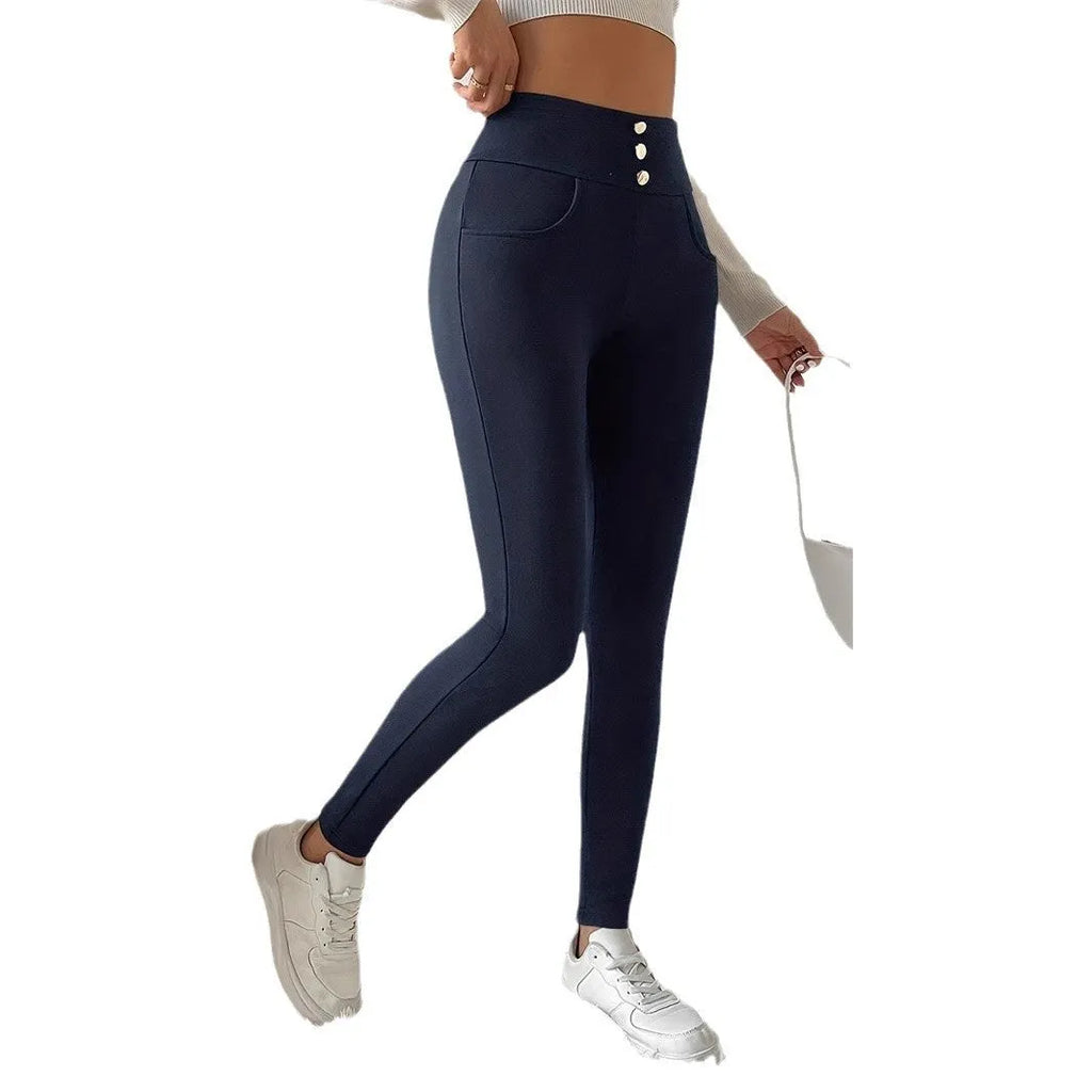 Navy blue women's high waist slim fit straight leg casual trousers on a hanger.