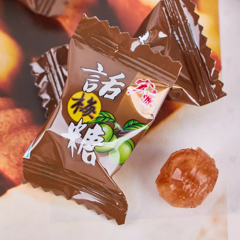 Assorted fruit flavoured hard candy bulk pack showing plum, guava, and tangerine peel varieties