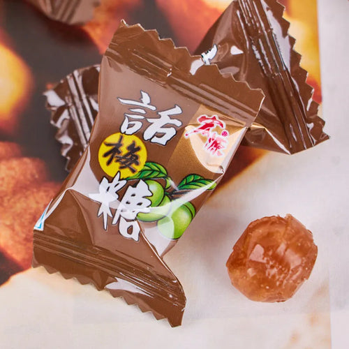 Assorted fruit flavoured hard candy bulk pack showing plum, guava, and tangerine peel varieties