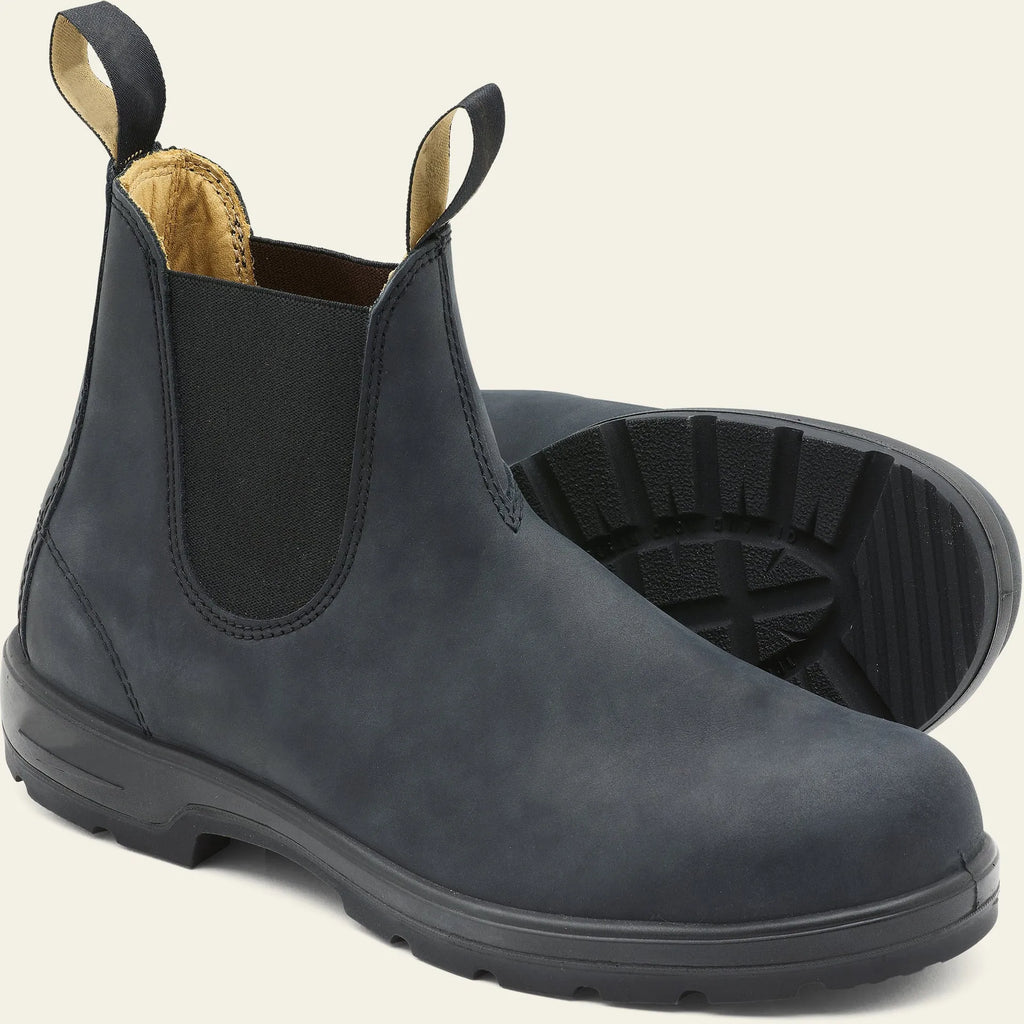 Vintage frosted brown Chelsea boot with round toe and mid-calf height on a neutral background.
