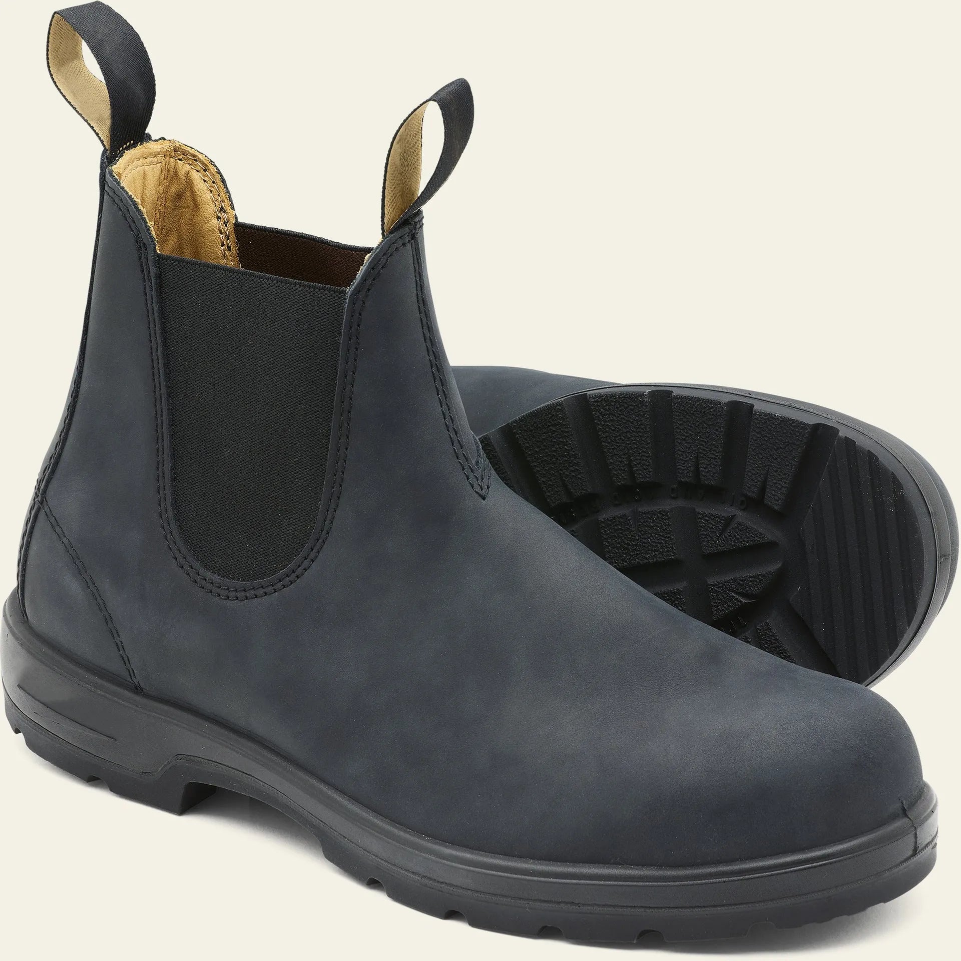 Vintage frosted brown Chelsea boot with round toe and mid-calf height on a neutral background.