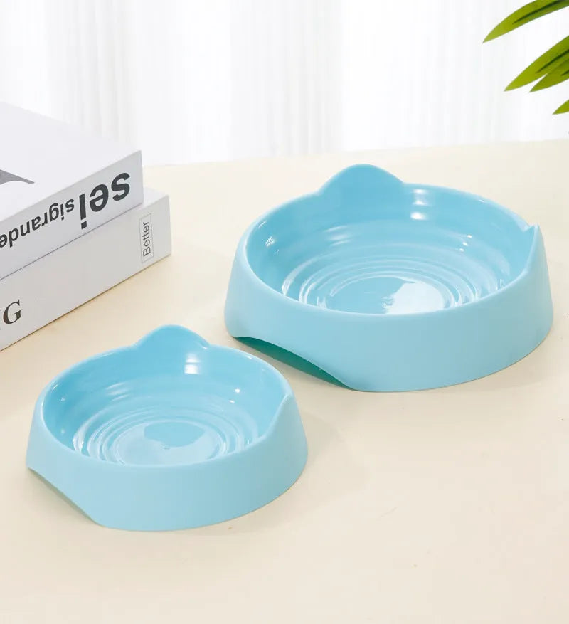 Blue ceramic dog slow feeder puzzle bowl with maze cups for large breed dogs.