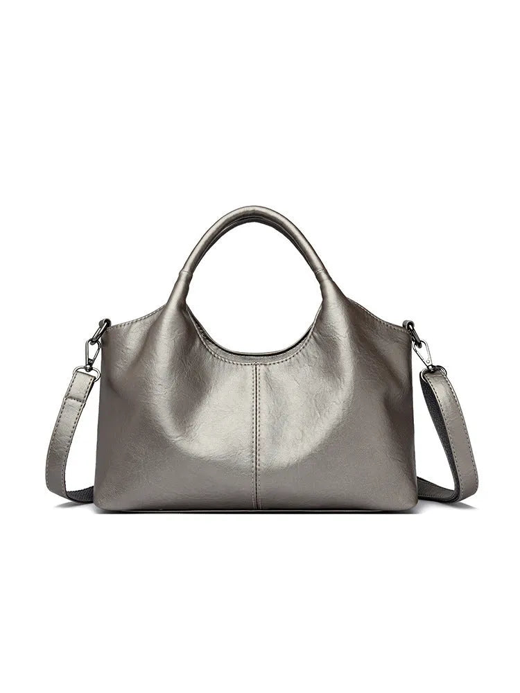 Genuine leather women's cross-body bag in a choice of seven colours including black, brown, and wine red