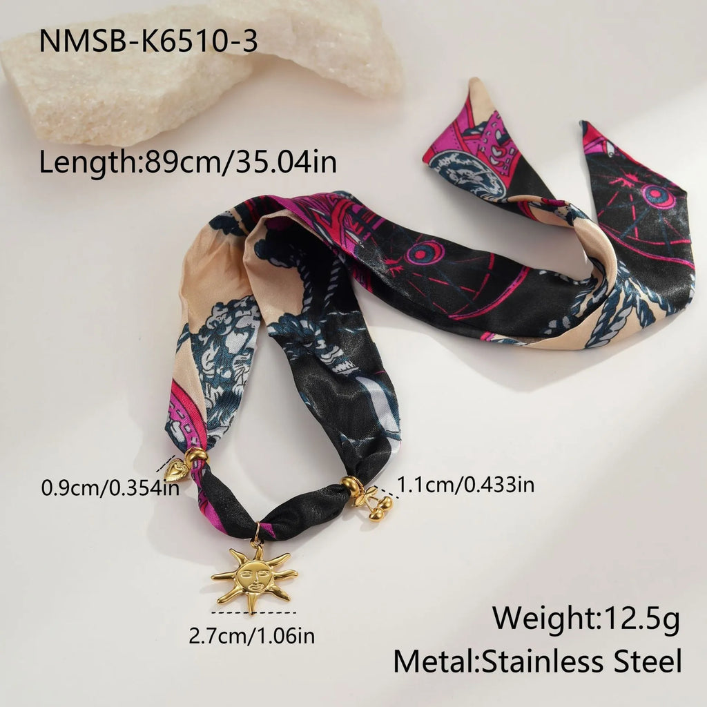 Women's geometric sun pendant necklace with stainless steel chain and 18K electroplated finish