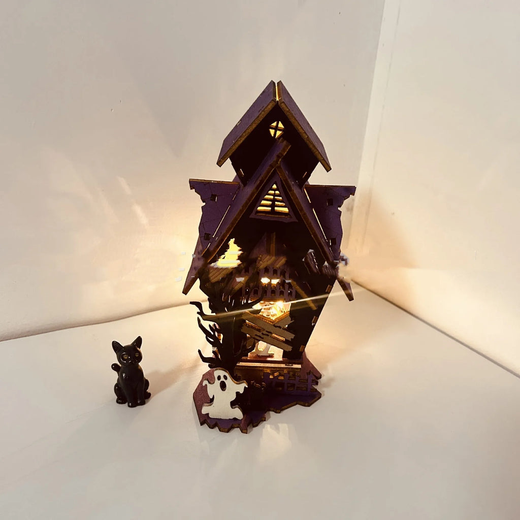 Wooden Halloween haunted house table decoration with luminous finish measuring 14x10.5x19cm
