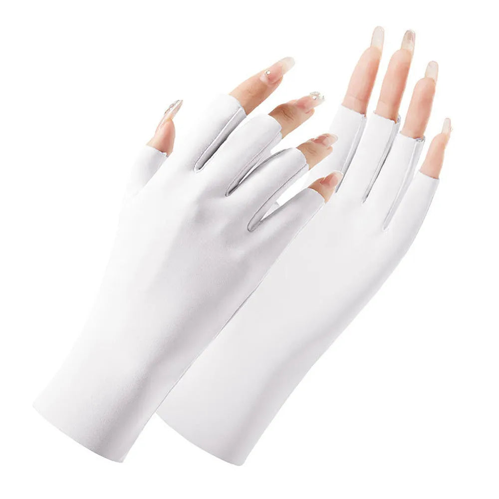 Thin beige women's sunscreen gloves with UPF50+ protection on a hand.