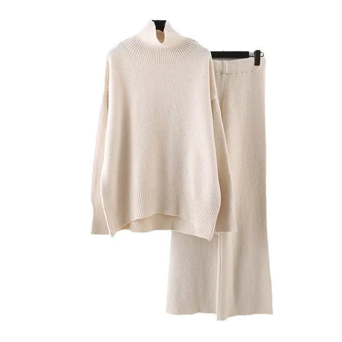 Women's solid colour sweater and wide leg trousers two-piece set in beige, shown as a coordinated outfit.