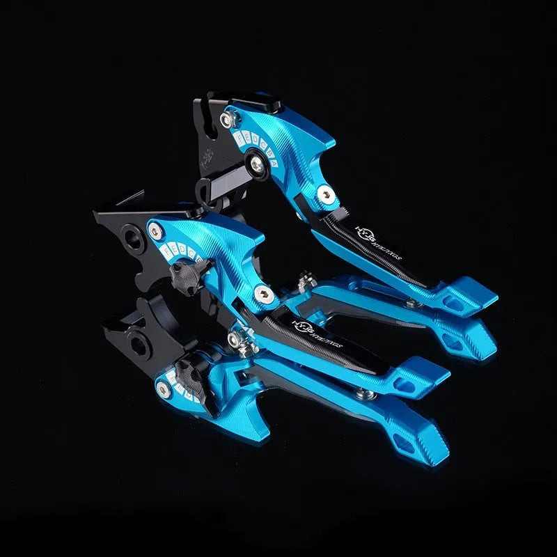 Pair of anodised metal motorcycle brake and clutch levers with adjustable length mechanism