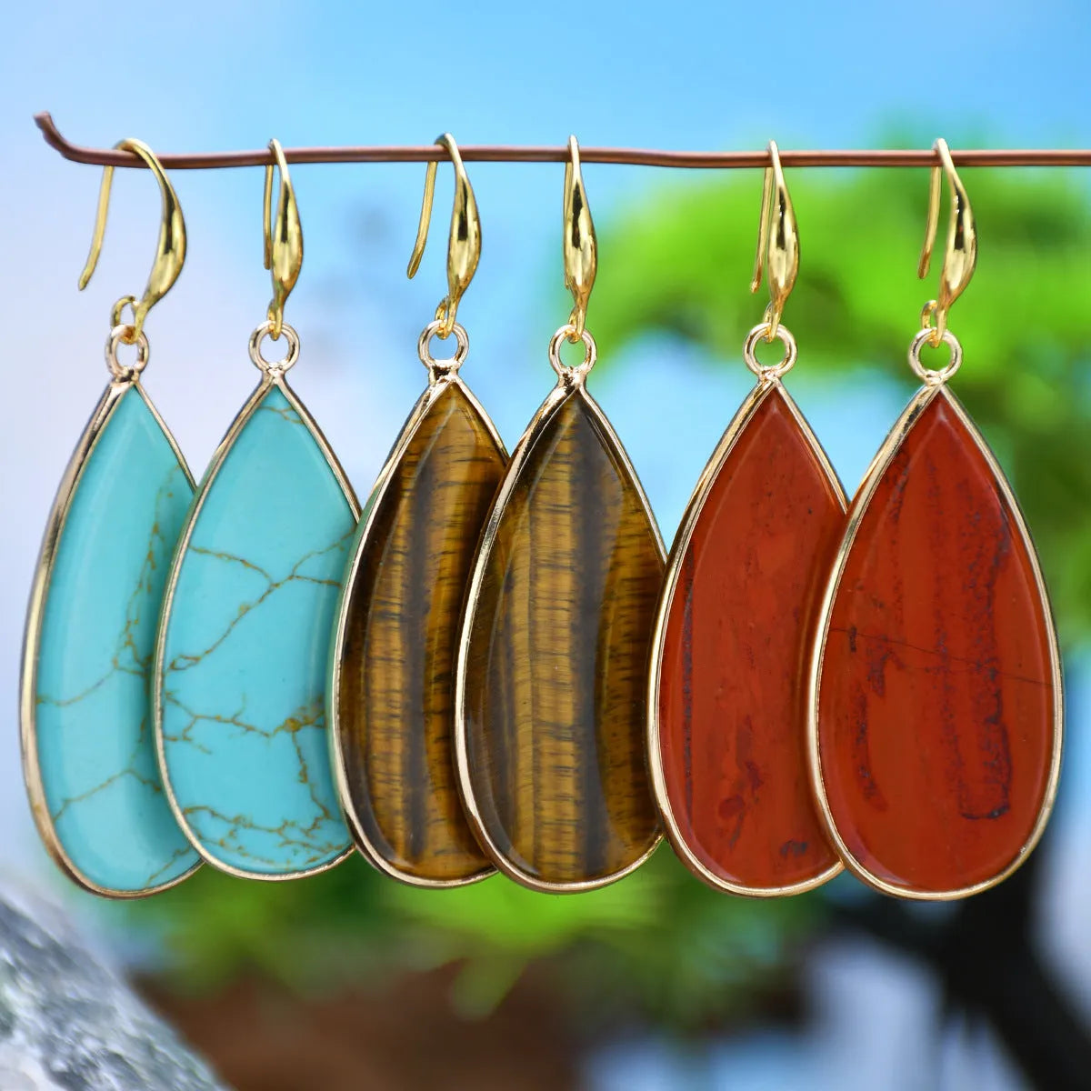 Vintage drop-shaped stone earrings in Tigereye, amethyst, pink crystal, Redstone, or turquoise colours.