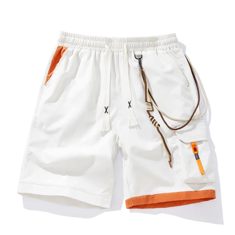 Man wearing loose-fit, high-waisted, cropped sports shorts in bamboo fibre.