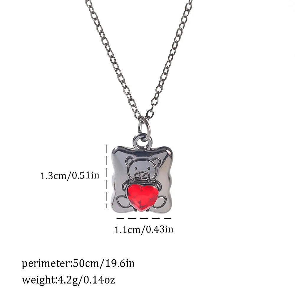 Dark style Halloween necklace for women with a choice of alloy bat, spider, or cross pendants on a chain.