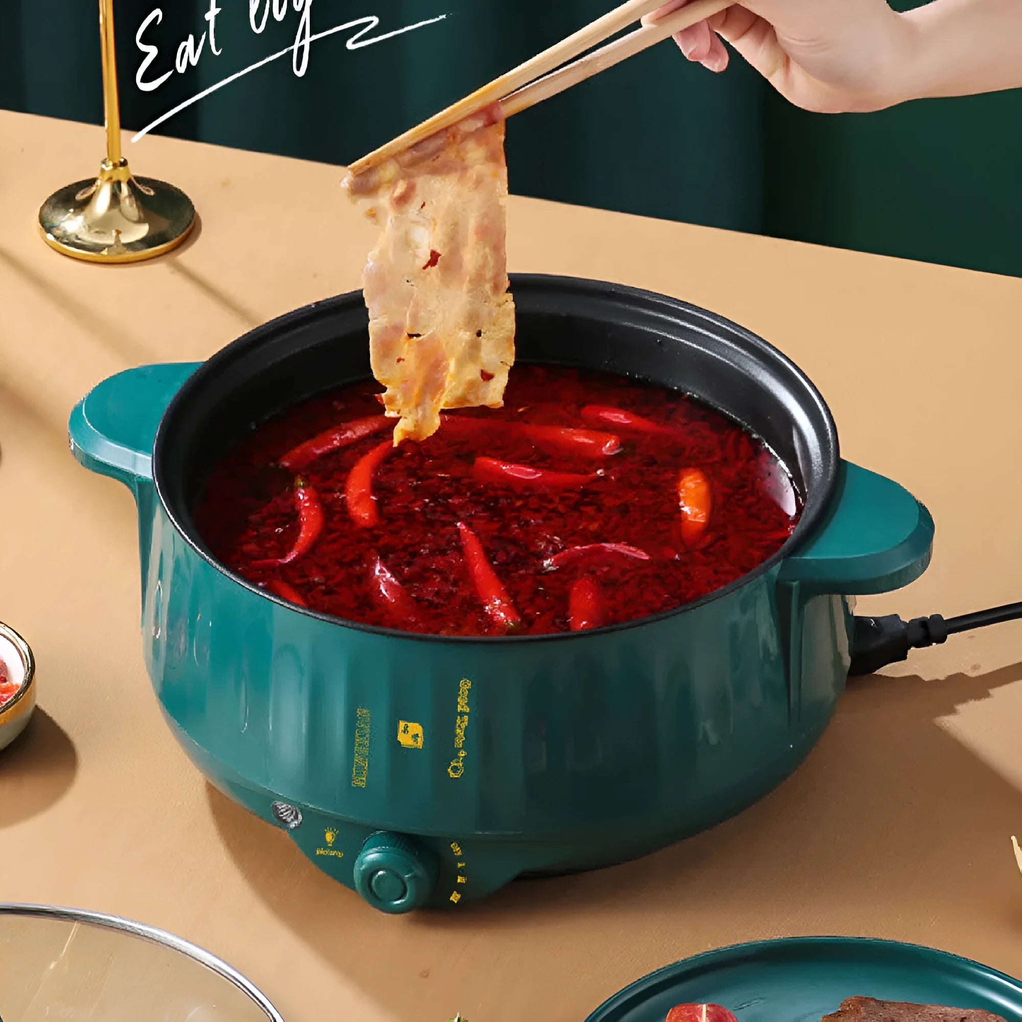 Electric hot pot with non-stick interior and integrated heating element in white or green finish
