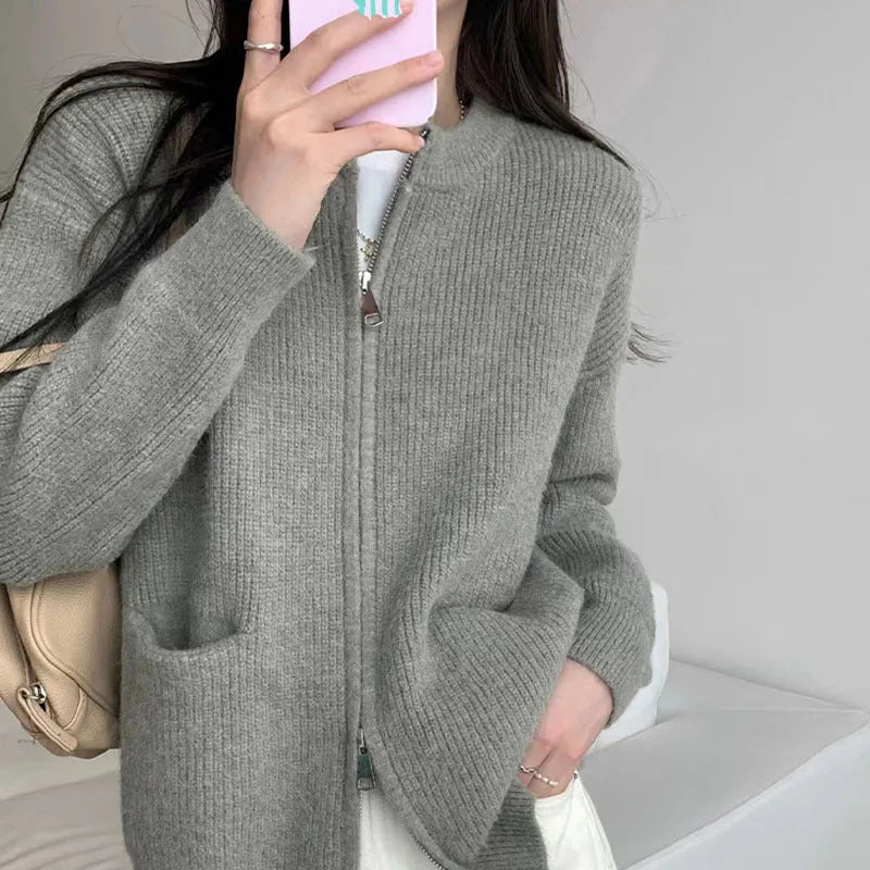 Beige soft glutinous sweater coat cardigan with long sleeves on hanger