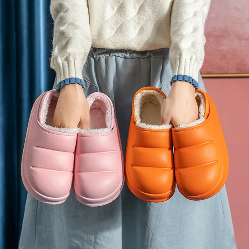 Women's waterproof garden slipper in green with plush lining and a textured non-slip EVA sole.