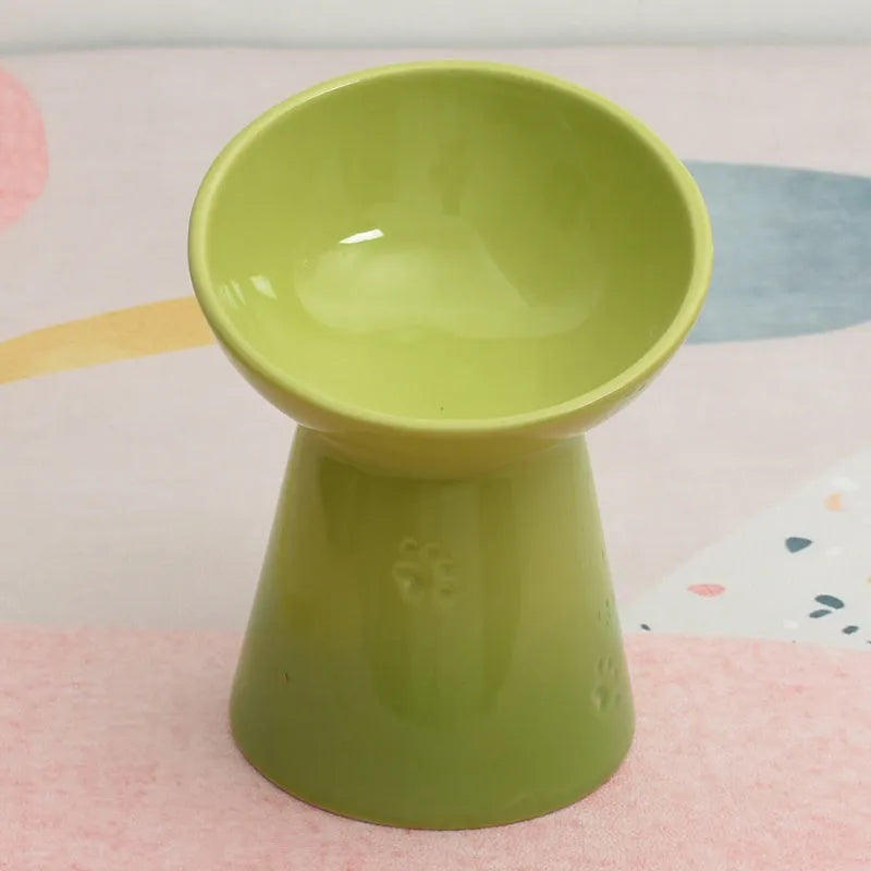 Ceramic pet bowl with anti-tumble design and raised chin support for cats and dogs